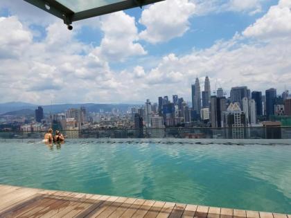 Staycation with Infinity Pool at Regalia Suites KL - image 12